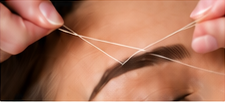Eyebrow threading treatment